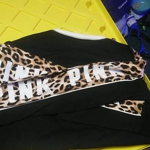 Pink cheetah print black shirt